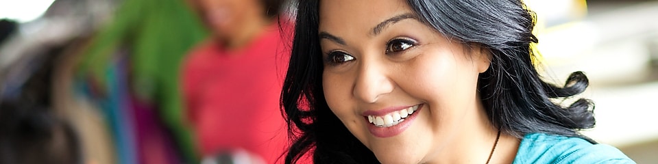 Young woman greating customer at a donation center